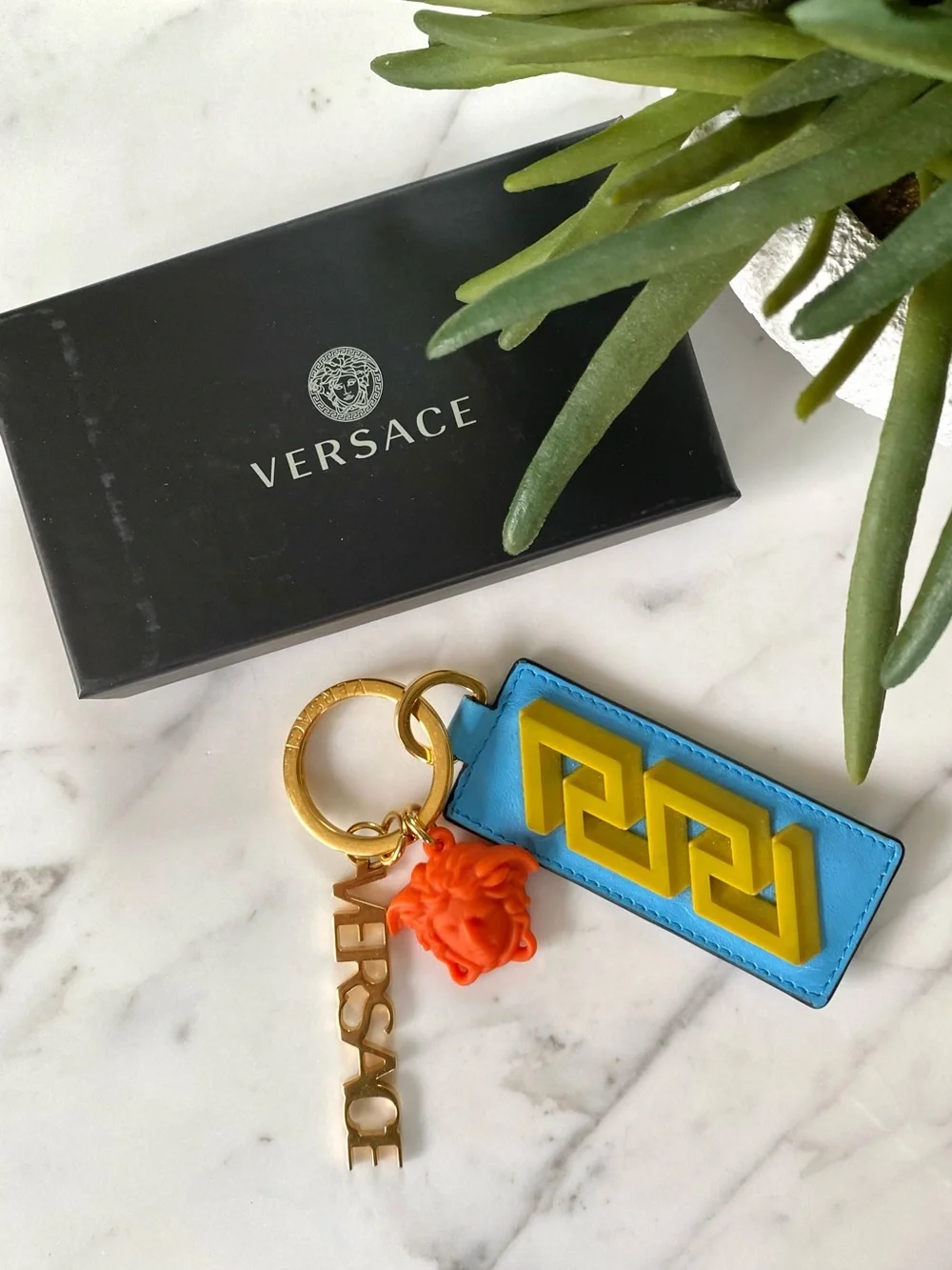 Versace blue leather